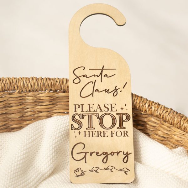 Santa Please Stop Here For Personalised Door Hanger engraved with the name Gregory.