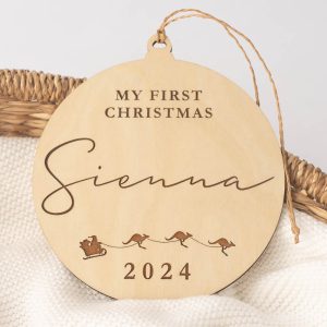 My First Christmas Personalised Disc 2024 in basket with the name Sienna.