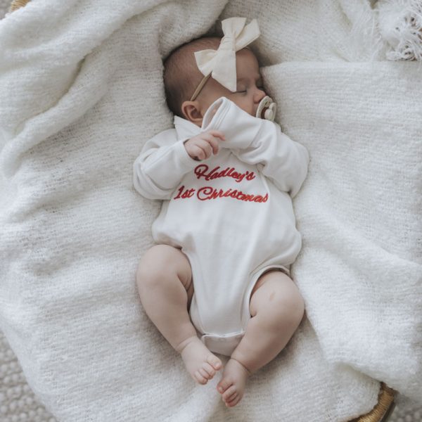 Personalised 1st Christmas Baby Romper embroidered with name Hadley.