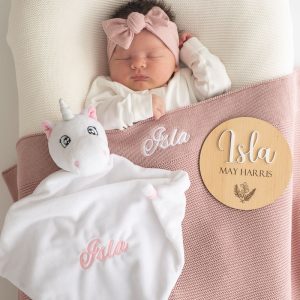 Personalised Blush Pink Blanket, Unicorn and 3D Baby Name Disc with a newborn girl..