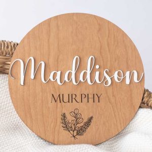 3D Birth Announcement Name Disc Dark with name Maddison in white acrylic.