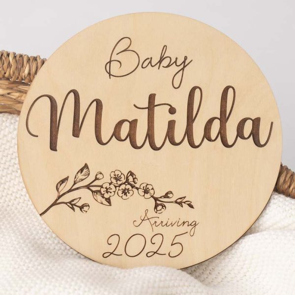Engraved wooden birth announcement disc with the girls name Matilda and year 2025.