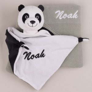 A Panda baby comforter & green sage knitted blanket both personalised with the name Noah.