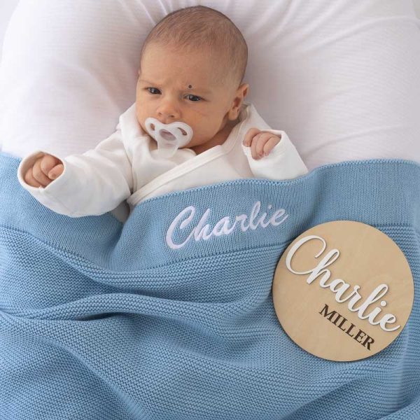 Personalised Blue Knitted Blanket and 3D Baby Disc embroidered with the name Charlie.