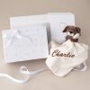 A personalised puppy comforter in a baby gift box.