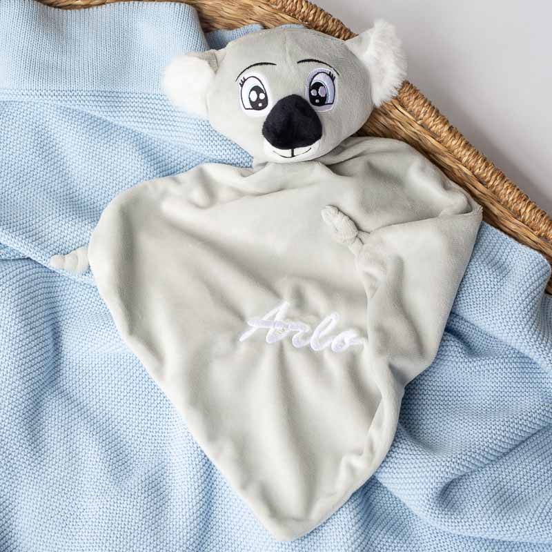 Personalised koala baby comforter boy gift idea with blue blanket.