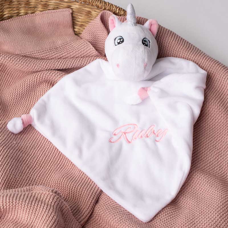 Personalised unicorn baby comforter in a basket unique girl present.