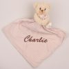 A bear comforter baby gift embroidered with the name Charlie.