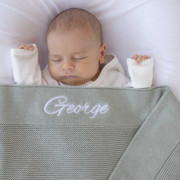 Personalised Green Knitted Baby Blanket embroidered with boys name George.