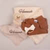 Cream Diamond Blanket, Bear and Onesie Baby Gift items embroidered with the name Hannah.