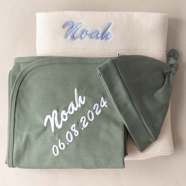 White Knitted Blanket, Olive green Swaddle and Beanie personalised with the name Noah.