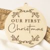 Wooden ornament engraved with our first Christmas gift for babies.