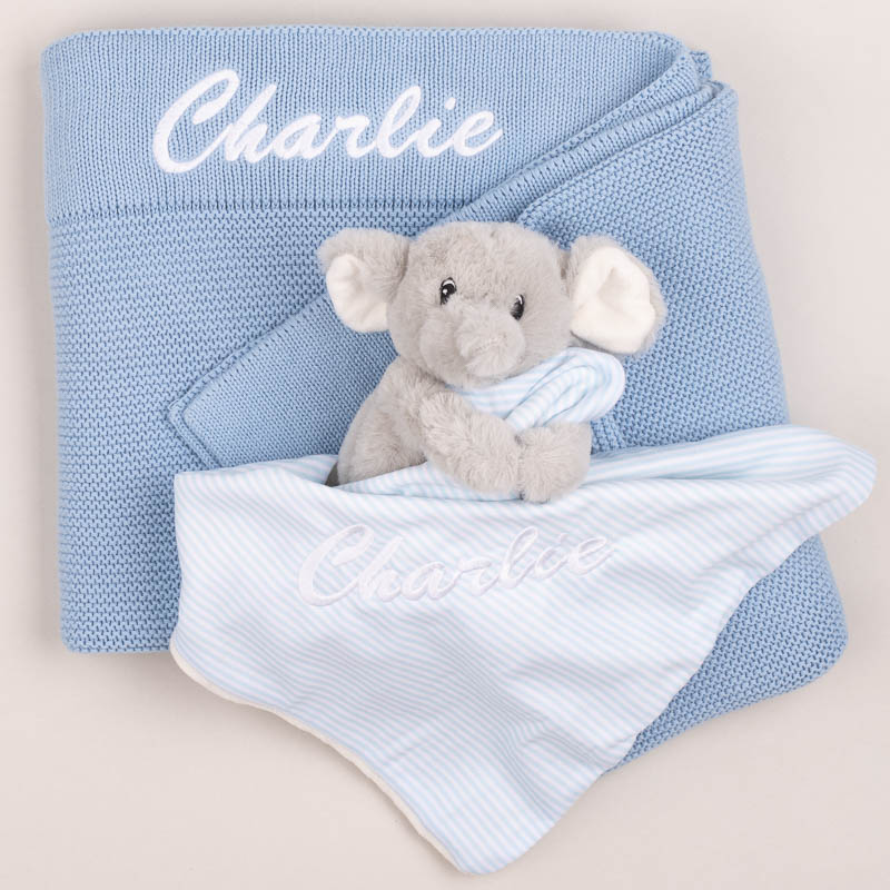 Personalised blue baby blanket and elephant embroidered with the name Charlie.